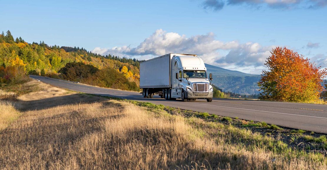 Burts Ranch tractor and trailer on route